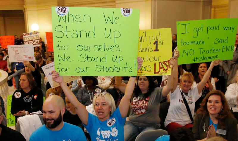 West Virginia Teachers Vote to Strike (AGAIN!) - Bloomberg Union Taps 1st Women of Color Prez - Labor Split on Amazon